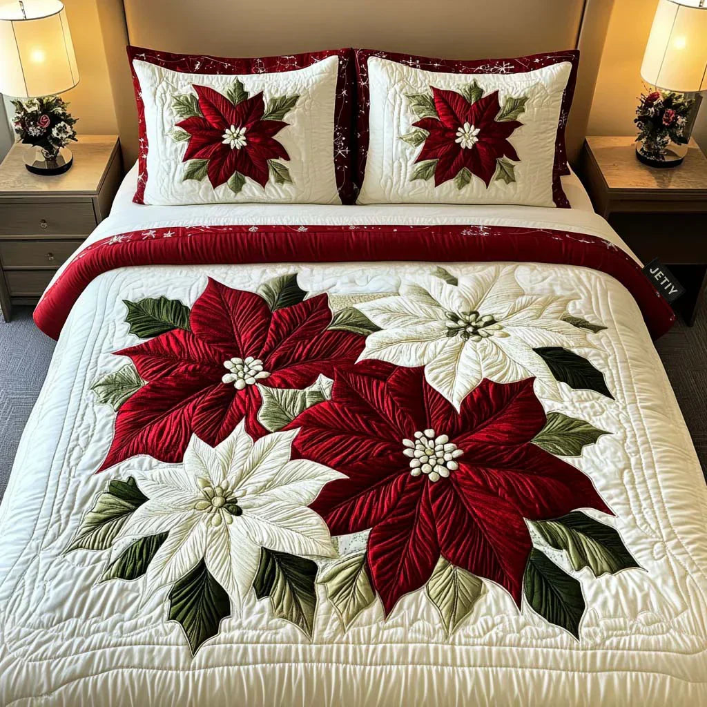 Quilted bed set with white base, red poinsettia flowers, and green leaves; king-sized bedding