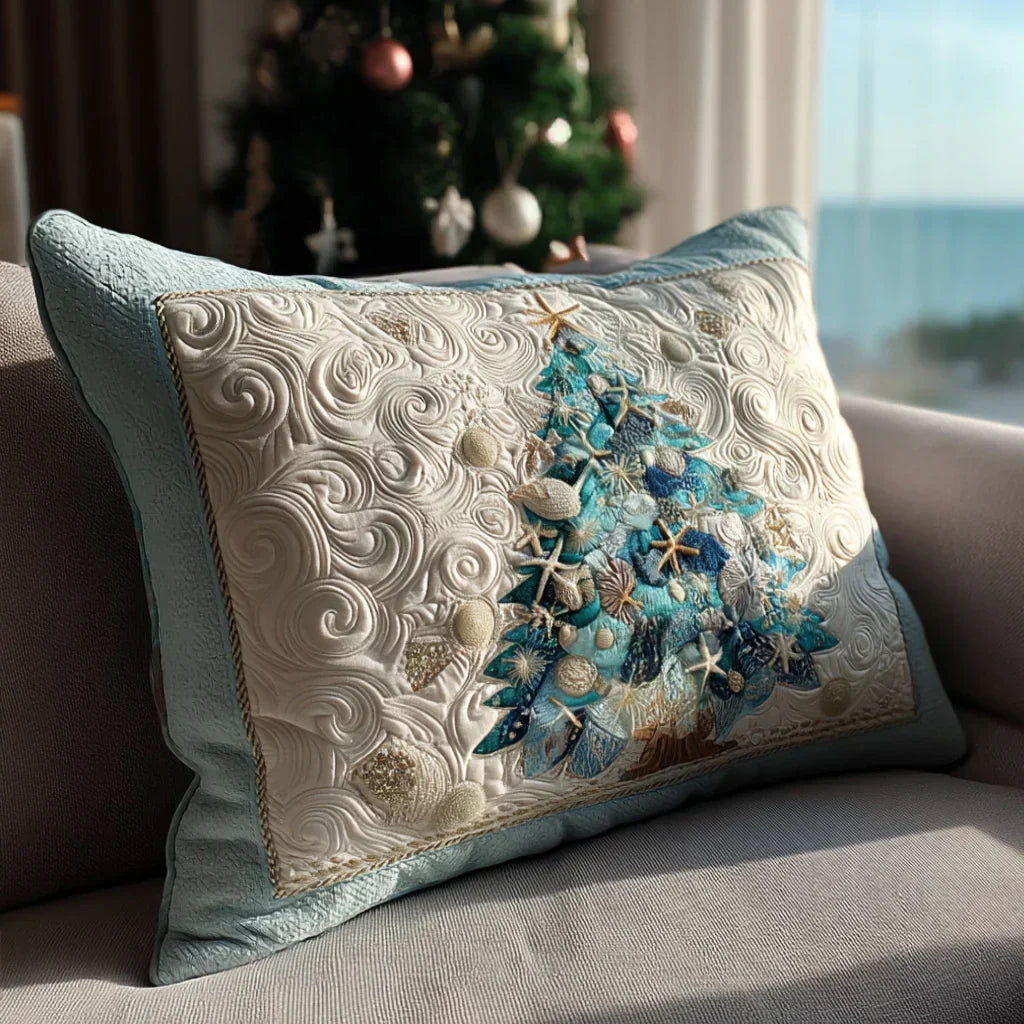 Quilted cushion cover with teal piping and white fabric, featuring blue starfish embroidery