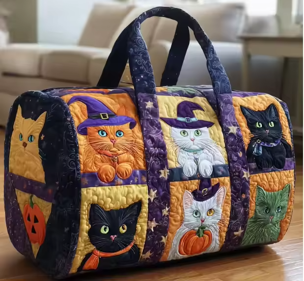 Quilted soft travel bag with cat faces and Halloween accents, purple handles