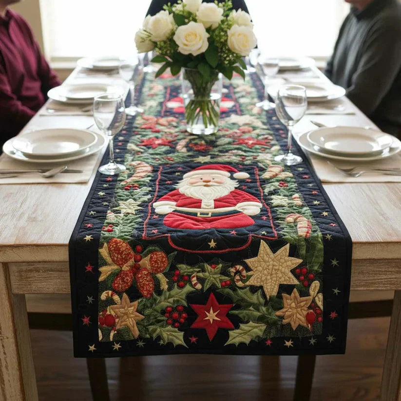 Quilted Christmas table runner with Santa figure and festive star and berry appliques
