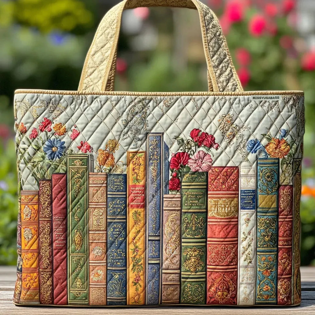 Quilted tote bag with colorful book-spine patchwork and dual top handles