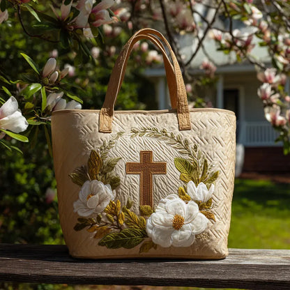 Beige handcrafted tote bag with embroidered floral border and central cross, two handles