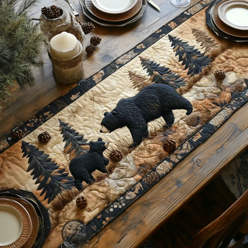 Quilted table runner with bear family silhouettes on a beige pine-pattern background and dark trim