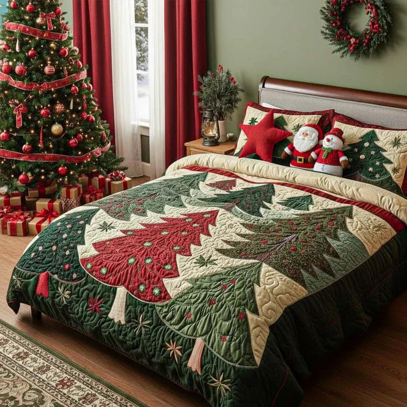 Quilted bed set with pine tree applique quilt and two shams in green, red, and cream.