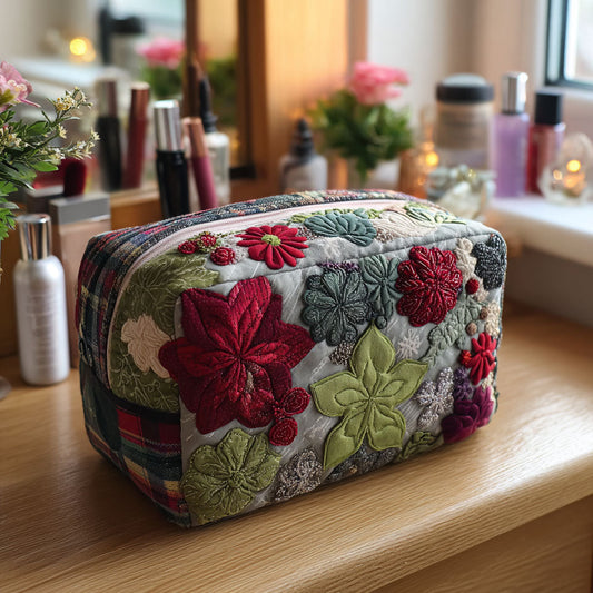 Quilted makeup bag with embroidered floral appliques and patchwork stripes, rounded.