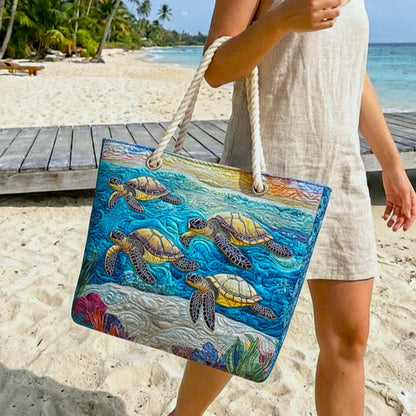 Handcrafted beach bag with blue sea turtle quilting and rope top handles