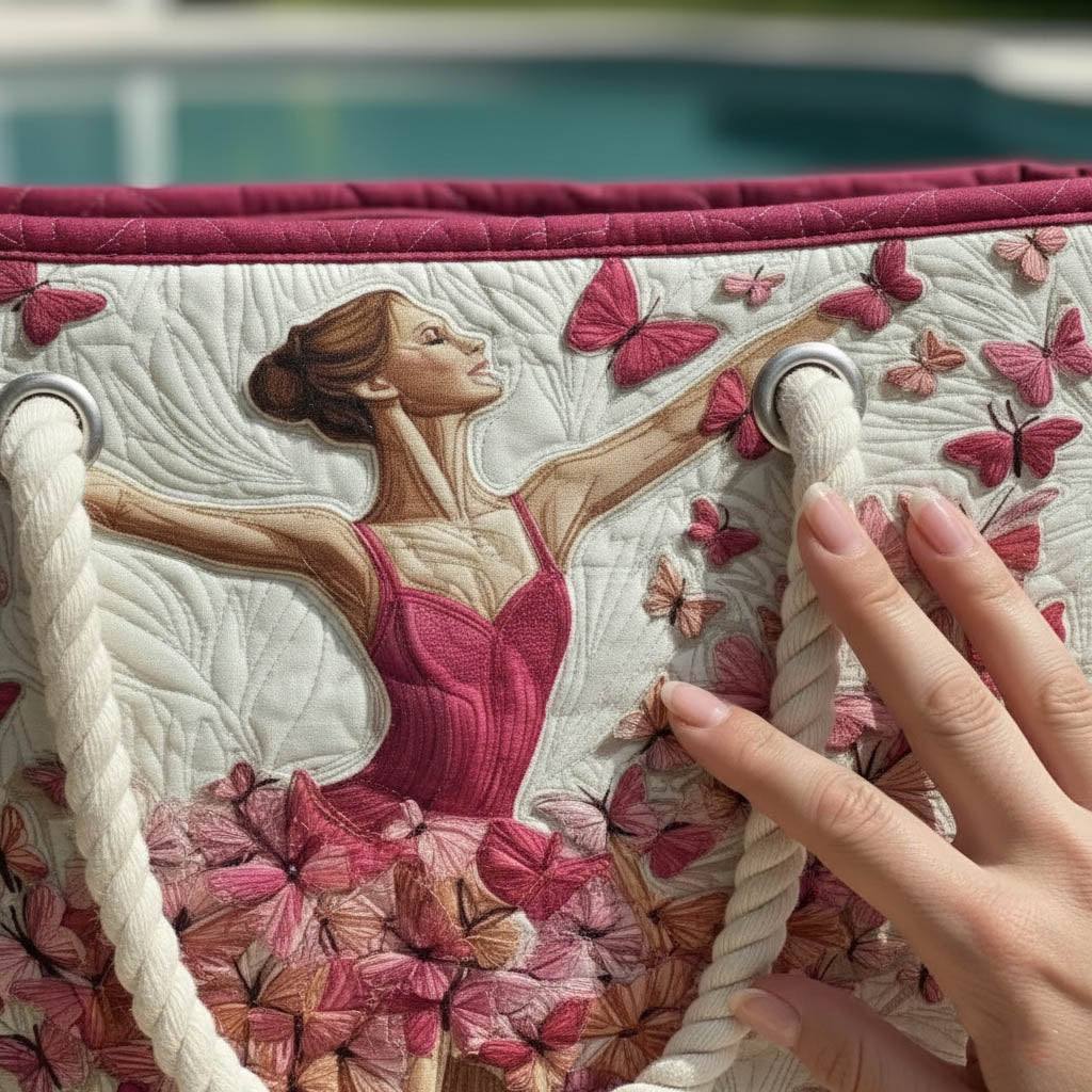 Close-up of quilted beach tote with ballerina illustration, butterfly pattern, rope handle