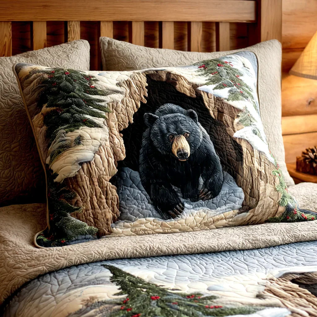 Quilted cushion cover with black bear applique and winter tree branches