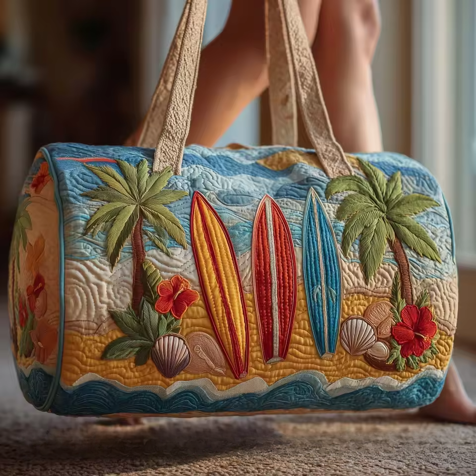 Quilted soft travel bag with tropical patchwork, palm trees and surfboard motifs