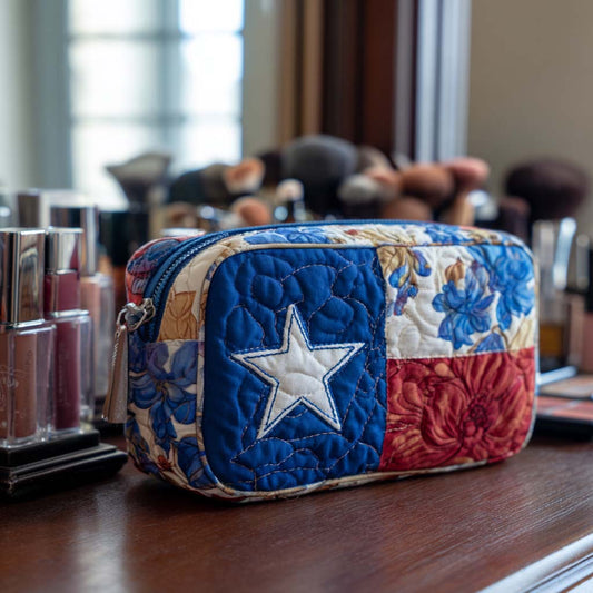 Padded makeup bag with quilted blue star patch and floral print panels
