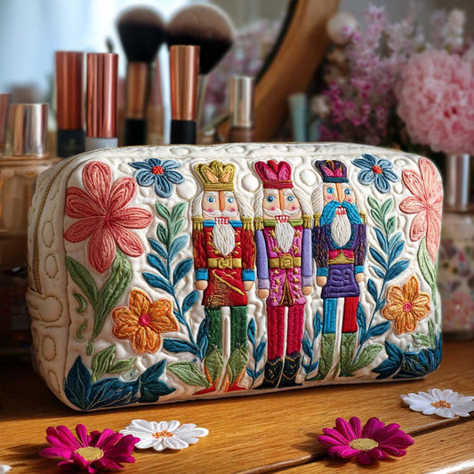 Quilted makeup bag with embroidered nutcracker characters and floral details