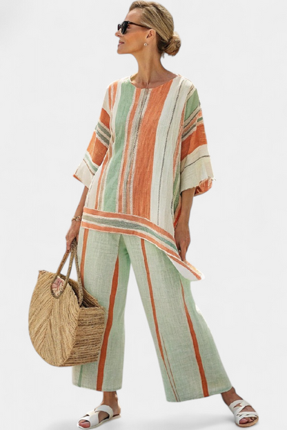 Striped tunic and wide-leg pants set with vertical green, orange, and cream stripes.