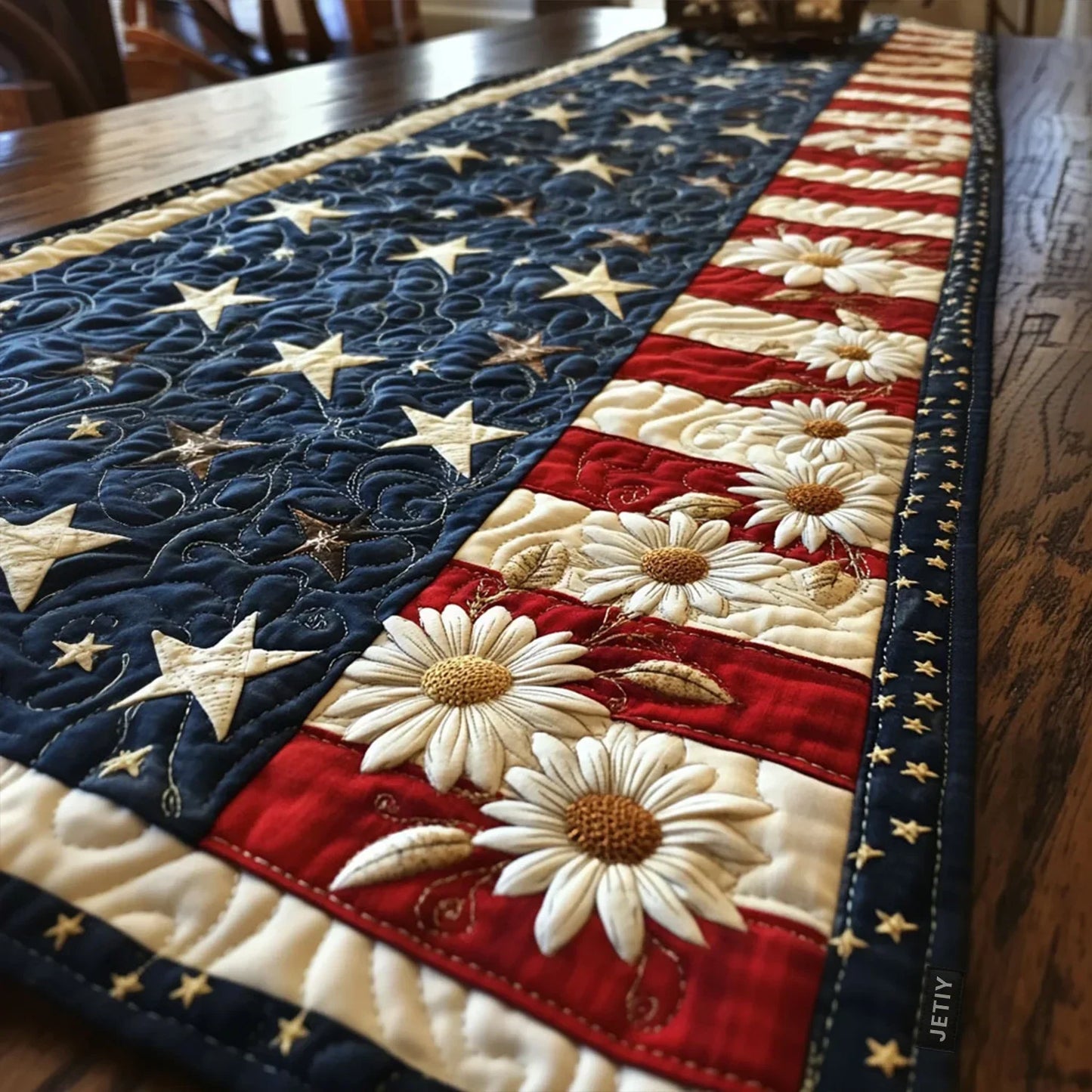 Quilted table runner with star and daisy appliques, navy, red, and cream patchwork