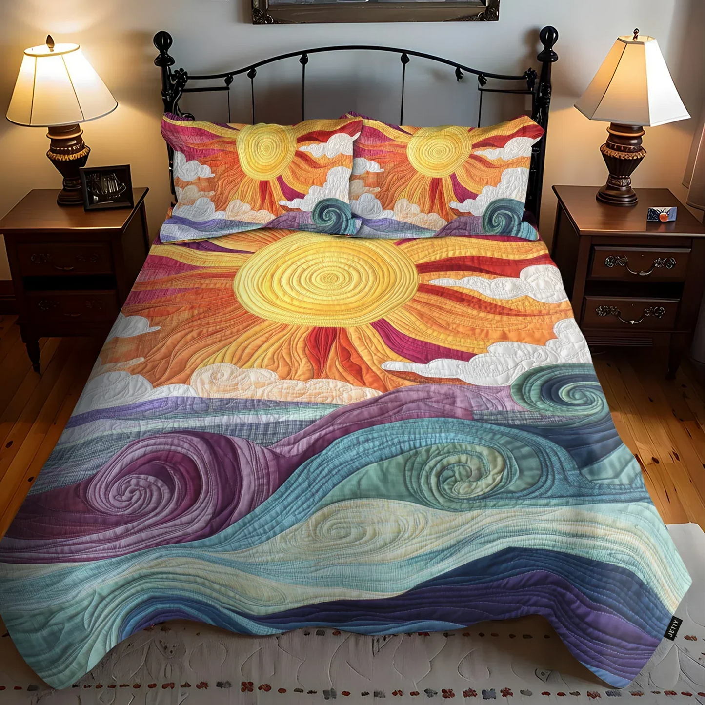 Quilted bed set with solar charm swirl pattern, fitted comforter and coordinating pillow shams