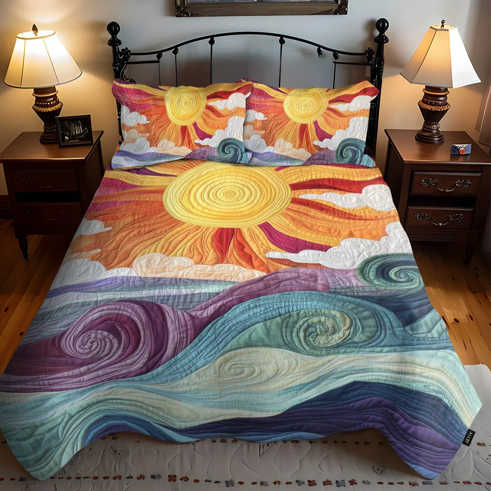 Quilted bed set with solar charm swirl pattern, fitted comforter and coordinating pillow shams