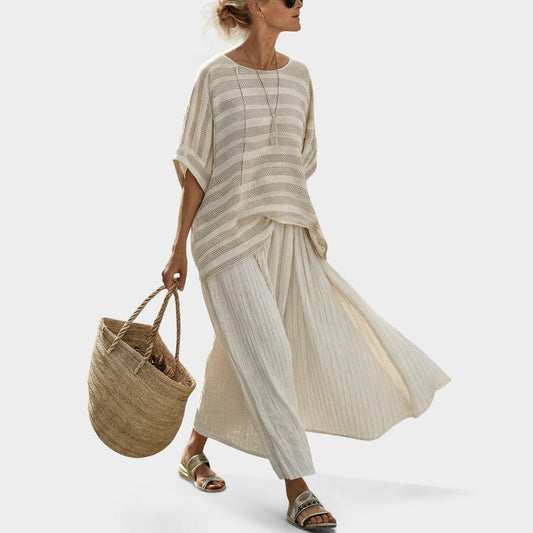 Cream striped loose blouse with draped hem and matching pleated skirt set