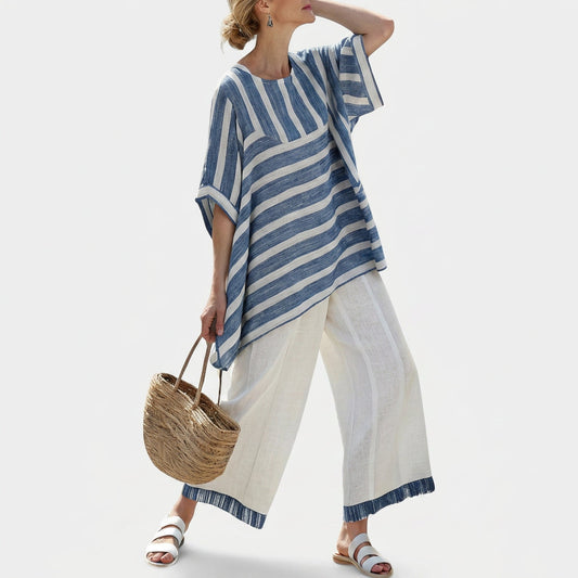 Blue-and-white striped tunic with cream wide-leg pants and blue-trim cuffs